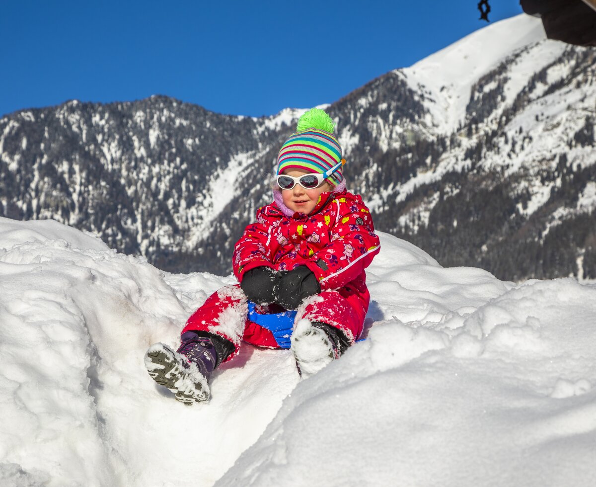 Kind mit Zipflbob im Schnee | © Urlaub am Bauernhof / Bernd Suppan