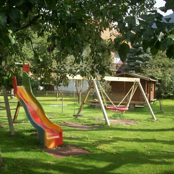 Slide, swing and Wendy house...