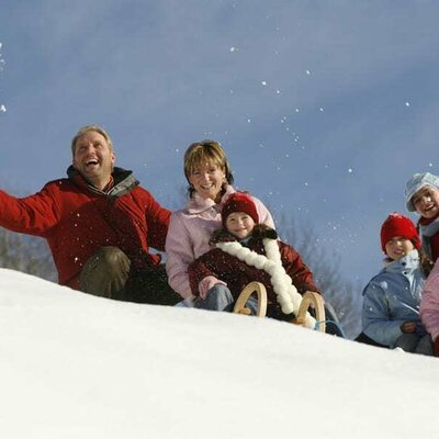 Tobogganing fun in the snow