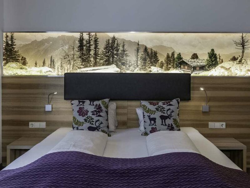 nawu_apartments_Apartment_Alpenapollofalter_sleeping_room