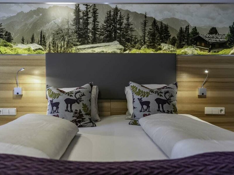 nawu_apartments_apartment_Alpenfalter_sleeping_room