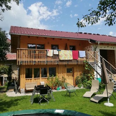 wooden terrace with acces to garden