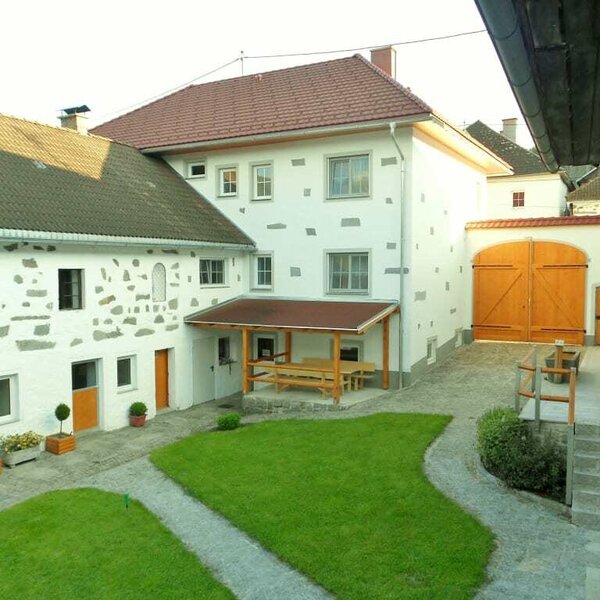 Inner courtyard of the Fuchsnhof in summer.