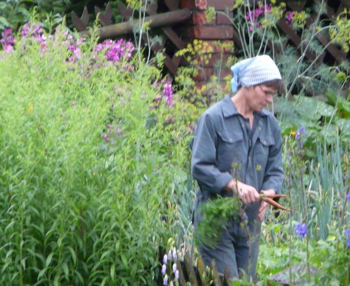 The farmer's wife in the garden.