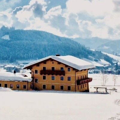 View from behind - Winter paradise in SalzburgerLand - skiing, cross-country skiing, ski touring, tobogganing, walking, snowshoeing, ...