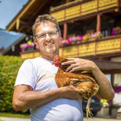 Gerhard Hartl with hen