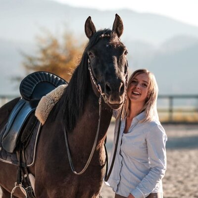 Riding instructor with horse