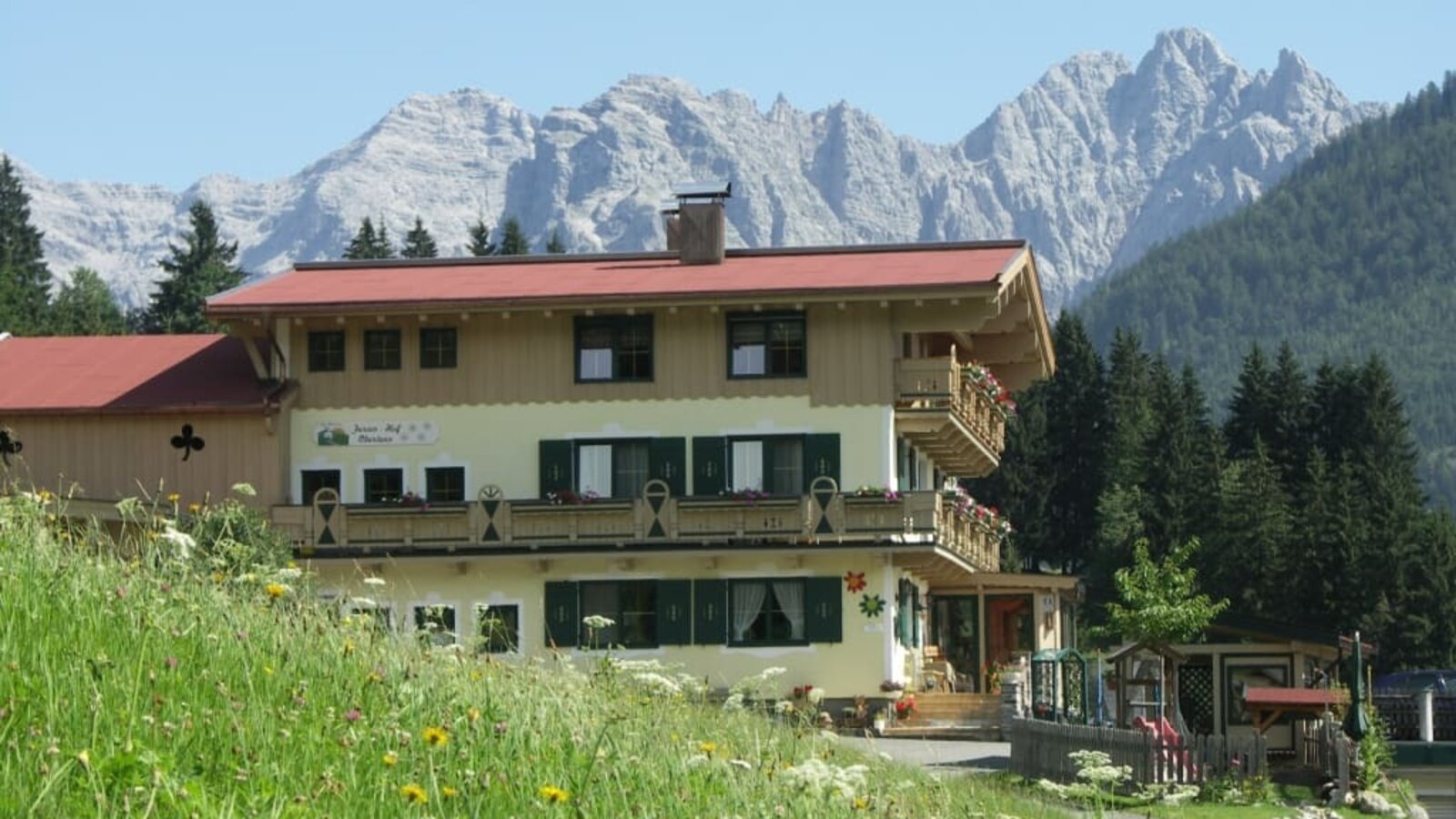 View from the yard of the Obertenn holiday farm, summer in Hochfilzen