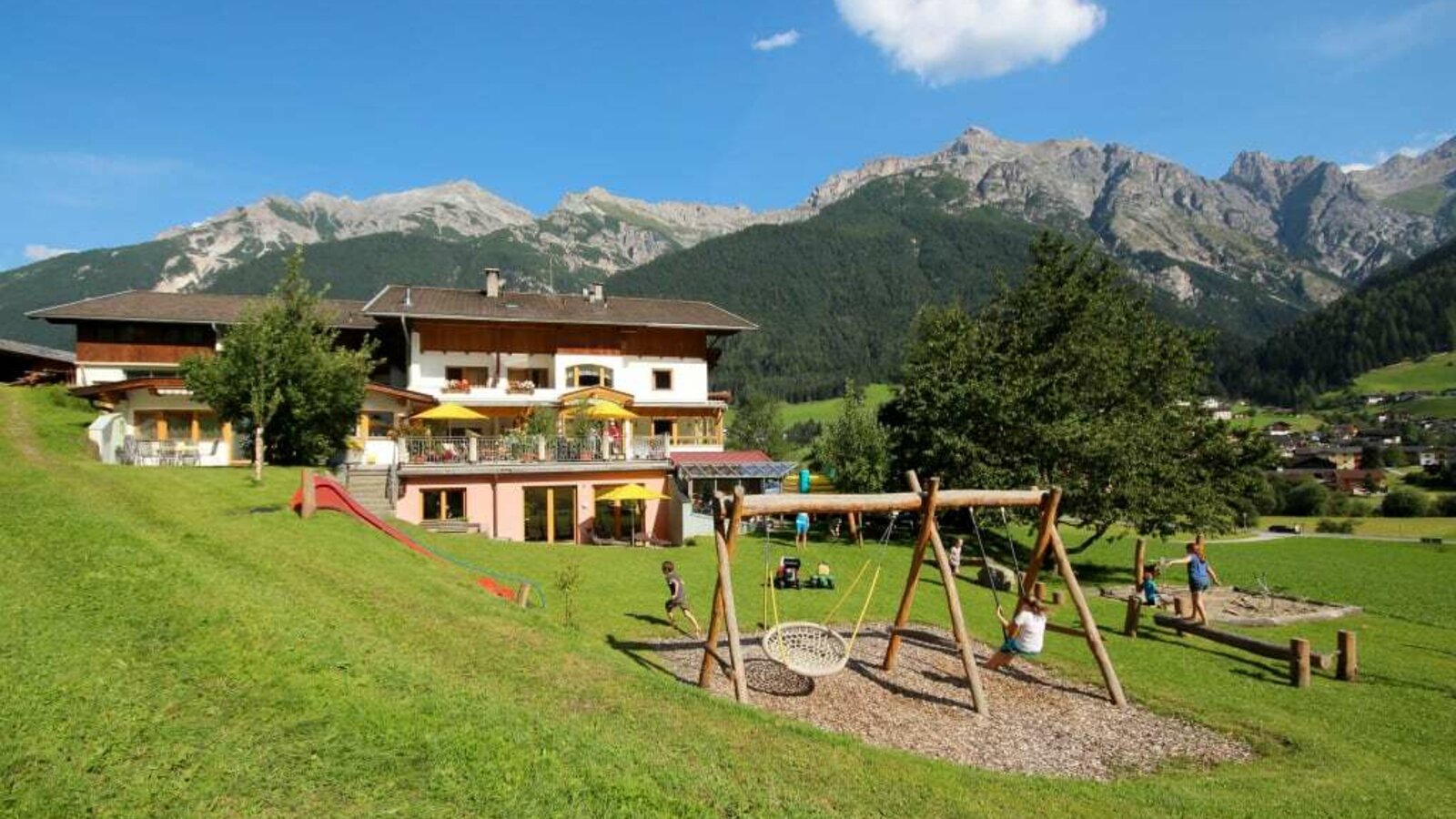 Pension Ladestatthof with playground in summer