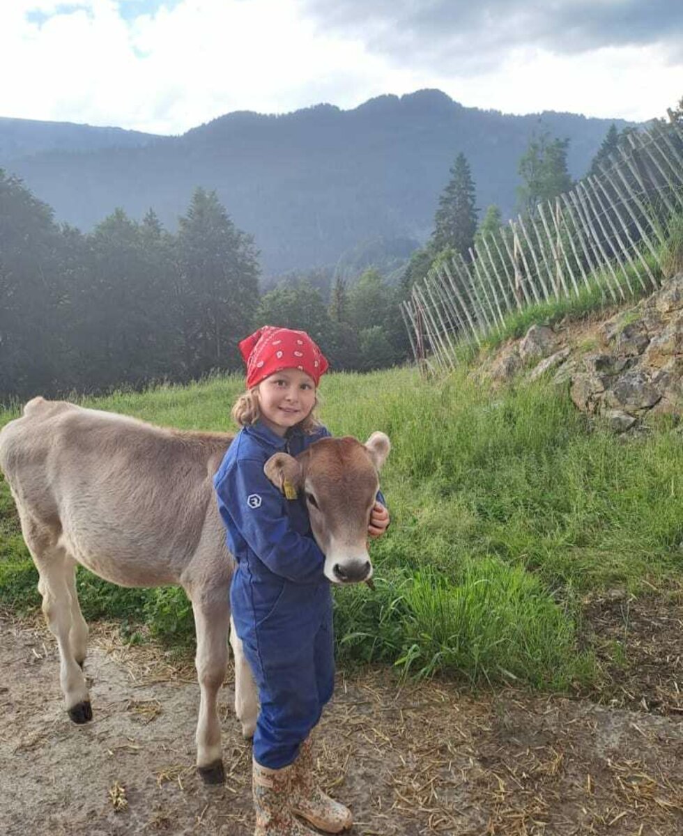 Girl with calf